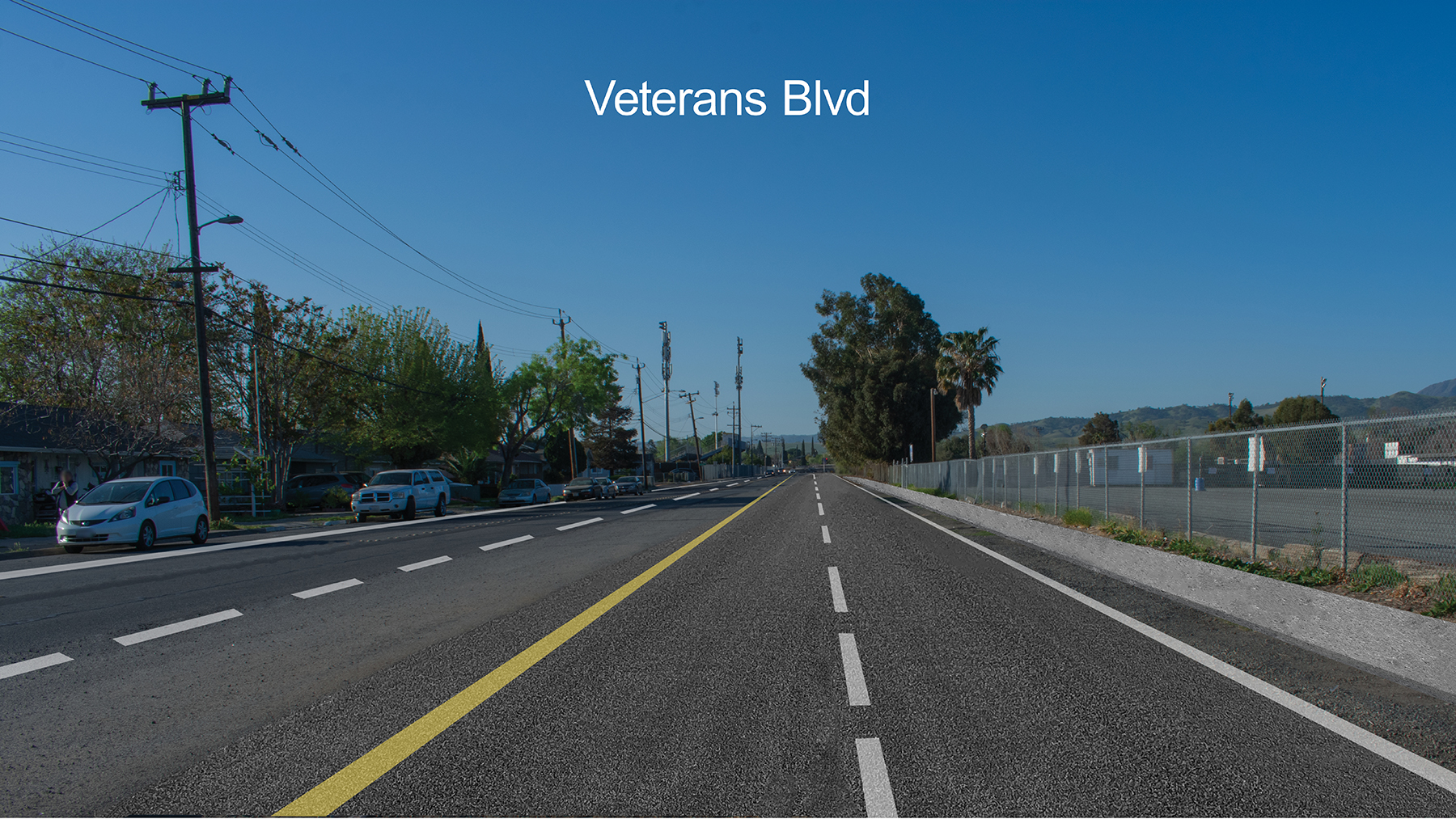 A slide for the original Veterans Blvd Presenation, an edited photo of what L Street could look like after lane expansion